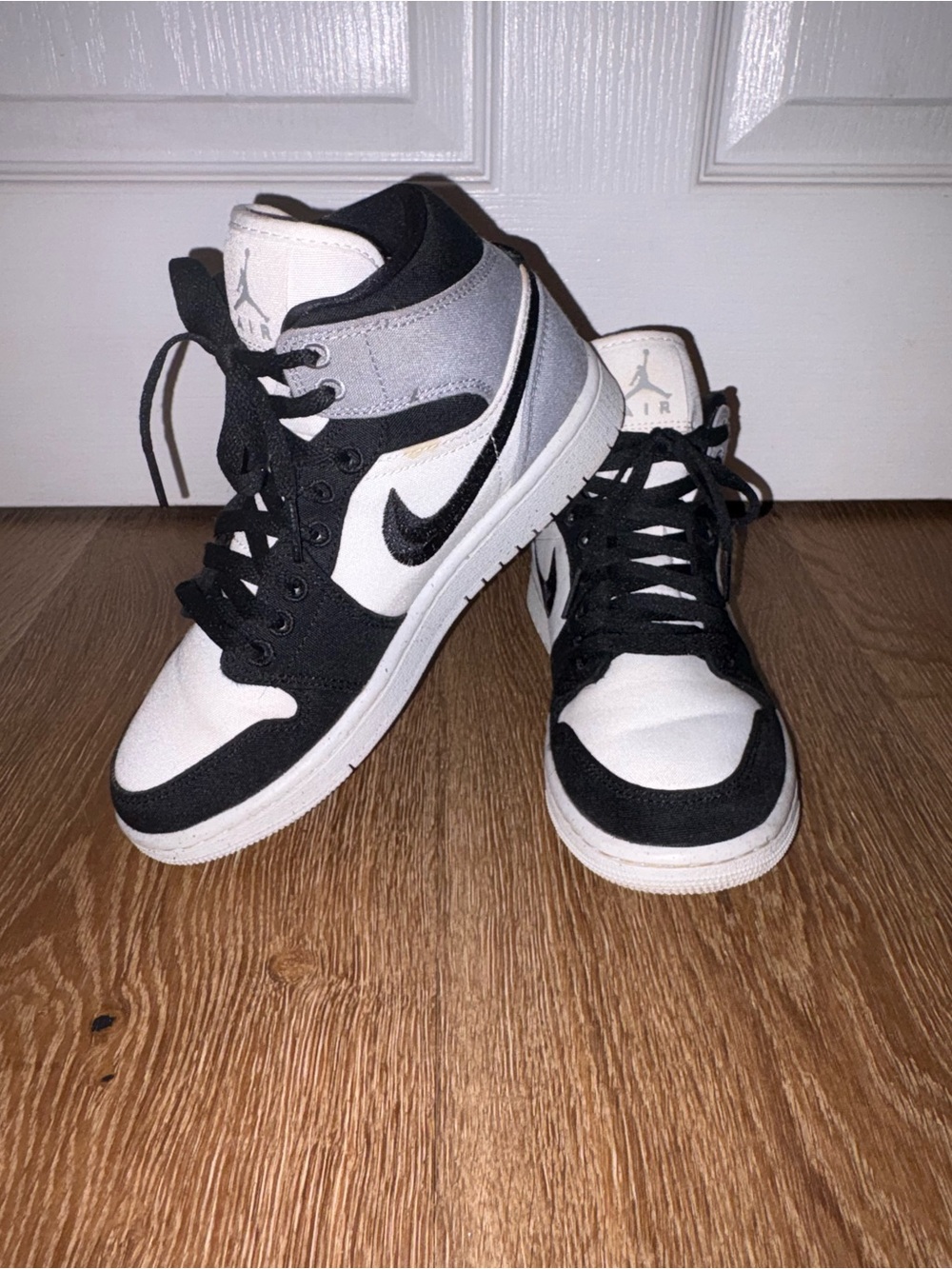 Nike Black and White Mid-Top Sneakers
